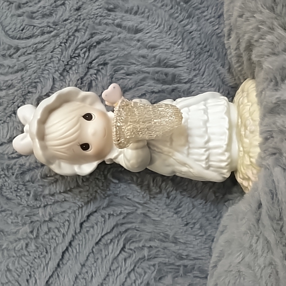 Precious Moments statue, vintage, 1990 Samuel J. Butcher. New condition.